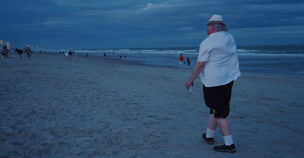 Hannah Myers' father walking down the South Carolina beach.