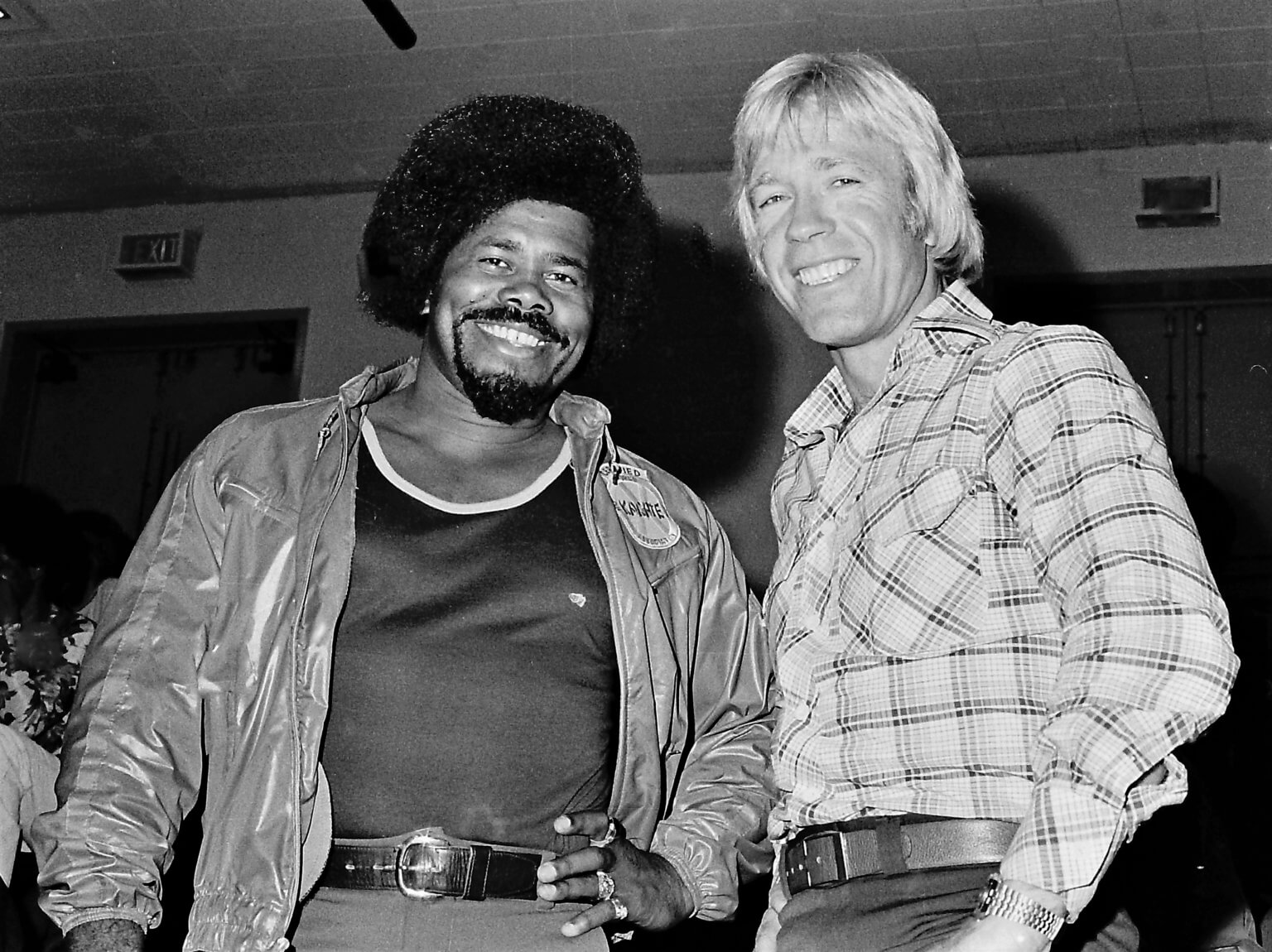 Black and white image of Vic Moore and Chuck Norris